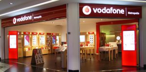 Insegna luminosa a led con pannelli in alluminio colore "rosso vodafone"